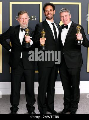 Hollywood, CA - 9. FEBRUAR: Dominic Tuohy, Guillaume Rocheron, Greg Butler posiert im Presseraum während der 92. Annual Academy Awards im Loews Hollywood Hotel am 9. Februar 2020 in Hollywood, Kalifornien. Foto: Christopher Victorio/imageSPACE/MediaPunch Stockfoto