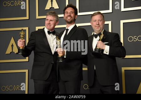 Los Angeles, USA. Februar 2020. Guillaume Rocheron, Dominic Tuohy und Greg Butler, Gewinner des Visual Effects Award für Ò ----<unk>, Ó posieren im Presseraum bei den 92. Annual Academy Awards, die am 9. Februar 2020 im Dolby Theatre in Hollywood, Kalifornien abgehalten werden. (Foto von Sthanlee B. Mirador/Sipa USA) Stockfoto