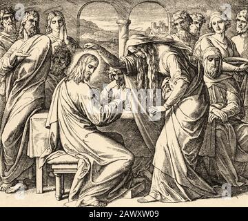 Jesus in Bethanien. Maria salbt den Herrn Jesus. Matthäus-Buch, neutestamentliche biblische Geschichte. Alte Gravur aus dem Buch Historia Sagrada 1920 Stockfoto