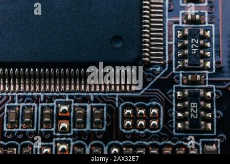 Platine reparieren. Elektronische Hardware moderne Technologie. Motherboard digital personal computer Chip. Tech Wissenschaft Hintergrund. Integrierte Kommunikation Prozessor. Information Engineering Komponente. Stockfoto