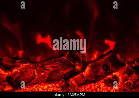 Feuer aus dem Hintergrund des Kamins Stockfoto