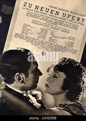 1937, DEUTSCHLAND: Die gefeierte schwedische Filmschauspielerin und Sängerin ZARAH LEANDER (* 1907 in ZU NEUEN Ufern ( La prigioniera di Sidney) von Douglas Sirk ( Detlef Sierck ), aus einem Roman von Lovis Hans Lorenz. Artikel aus dem Filmprogramm ILLUSTRIERTE FILM-KURIER, 1937 . - ATTRICE - FILM - FILM - KINO - Porträt - Ritratto - KINO NAZISTA - FILM - locandina pubblicitaria cinematografica - POSTER - Embrace - abbraccio - Profilo - Profili - NazISMO - NAZISMUS - UFA --- Archivio GBB Stockfoto