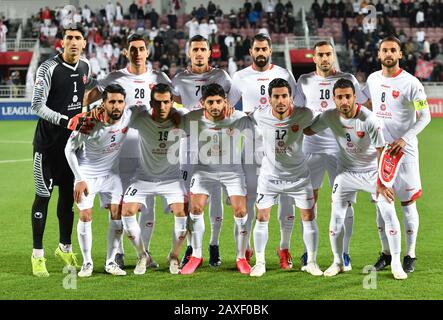 Doha, Katar. Februar 2020. Die Spieler des FC Persepolis posieren für ein Teamfoto vor dem Fußballspiel der AFC Champions League Gruppe C zwischen Katars Duhail SC und dem iranischen Persepolis FC in Doha, Katar, 11. Februar 2020. Kredit: Nikku/Xinhua/Alamy Live News Stockfoto