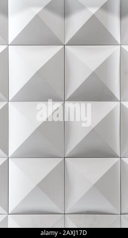 3D-Zierwand für das Innere einer ungewöhnlichen geometrischen Form. Weißer Lichthintergrund mit einem Muster, das einen Baum imitiert. Abstrakte Textur Stockfoto