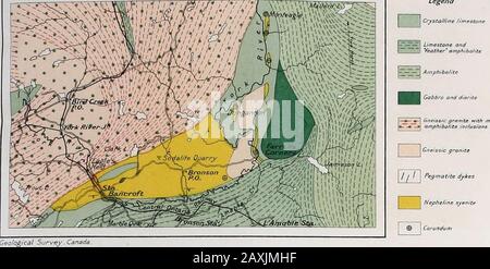 Führer der Exkursionsbücher in Kanada1-10. In Richtung der Bewegung von itsflow, wie durch ihr Verhältnis zur Richtung der ITSfoliation gezeigt. Es handelt sich dabei eindeutig um Fragmente des Limestonekover des Batholiths, die in das Magma des eindringenden Batholiths gefaltet wurden, oder um Havefallen. Das Nephelinsyenit zeigt eine deutliche Bänderung und Foliation, die der Foliation von Thegneissic-Granit sowie der Bettwäsche der Limestoneserien entspricht. In Bancroft ist dieses Nephleinsyenit fast eine Meile (i -6 km) in der Breite, die über den Schlag der Foli-ation gemessen wird, das DIP b Stockfoto