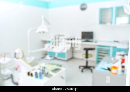 Zahnheilkunde, Medizin und Zahnmedizin Konzept - verschwommenes moderne Zahnarztpraxis Office Interior bokeh Stockfoto