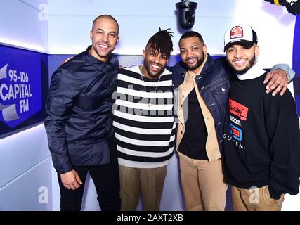 (Von links nach rechts) Marvin Humes, Oritse Williams, JB Gill und Aston Merrygold von JLS, die in den Global Radio Studios in London nach der Ankündigung erscheinen, dass die Boyband reformieren soll. Stockfoto