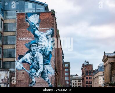 Guido van Helten Wandbild von Kieran Merrilees, schottischer Badminton Spieler für Commonwealth Games 2014, Wilson Street, Glasgow, Schottland, Großbritannien Stockfoto