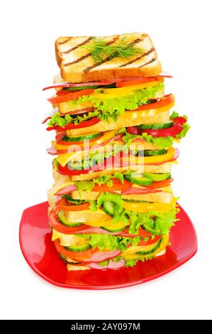 Riesen-Sandwich auf dem weißen Hintergrund isoliert Stockfoto