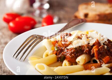 Bolognese und Parmesan Stockfoto