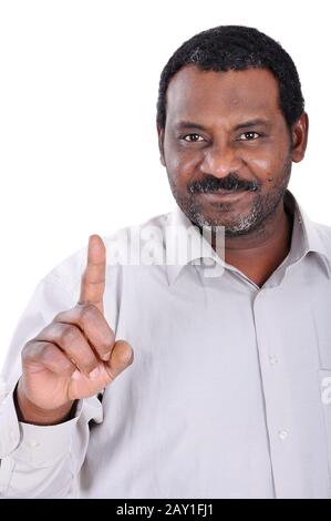 Gutaussehender afroamerikanischer Geschäftsmann, der zeigt Stockfoto