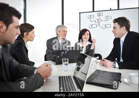 Geschäftsleute, die ein Geschäftstreffen führen Stockfoto