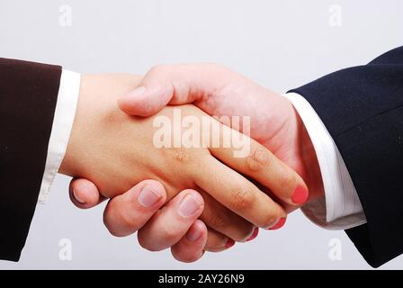 Zwei Hände schütteln Stockfoto