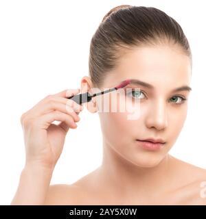 Augen-make bis gelten. Mascara auftragen Closeup, lange Wimpern. Make-up Pinsel. Isoliert. Stockfoto