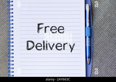 Kostenlose Lieferung text Konzept auf Notebook Stockfoto