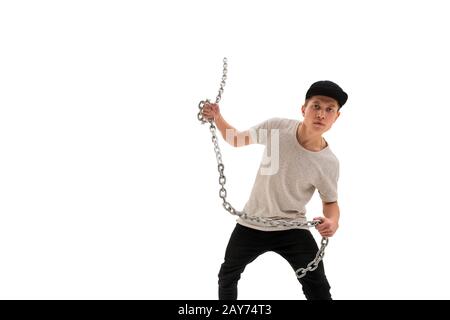 Jungen rap-Tänzerin mit Metallkette posiert im studio Stockfoto