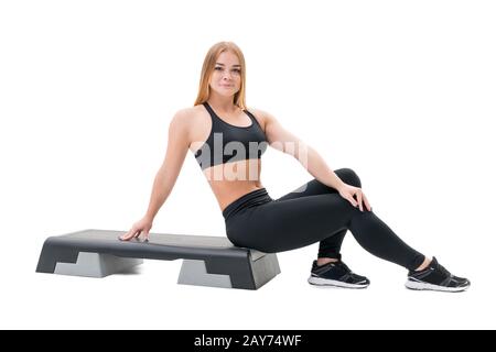 Schritt-Fitness-Trainer mit Stepper im studio Stockfoto