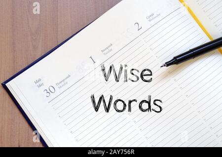 Weise Worte Konzept auf Notebook Stockfoto