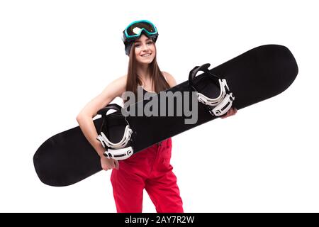 Schöne junge brünette Frau in Schwarz kurze Tank Top halten Schnee Stockfoto