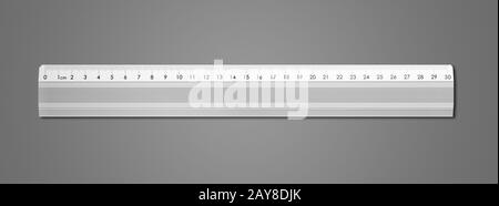 Metall Lineal auf dunkelgrauem Hintergrund isoliert Stockfoto