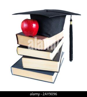Graduiertenhut, Bücher und apple Stockfoto