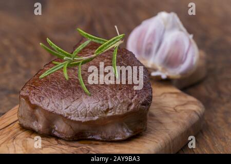 Gegrilltes Steak auf dem Schneidebrett Stockfoto