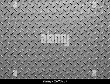 Metallplatte aus grauem Stahl mit lackierter Oberfläche und Struktur mit Diamantmuster Stockfoto