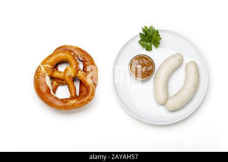 Bayerische Kalbswurst mit Brezel Stockfoto