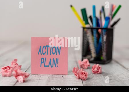 Textzeichen mit Aktionsplan. Konzeptfoto vorgeschlagene Strategie oder Vorgehensweise für einen bestimmten Zeitraum des normalen Notizbuchs Stockfoto