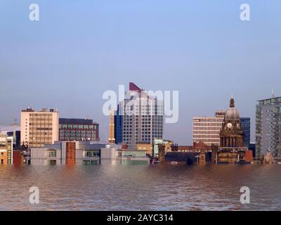 Ein konzeptioneller Blick auf das Stadtbild von leeds, der die Gebäude und das Rathaus nach Überschwemmungen aufgrund der globalen Erwärmung zeigt Stockfoto