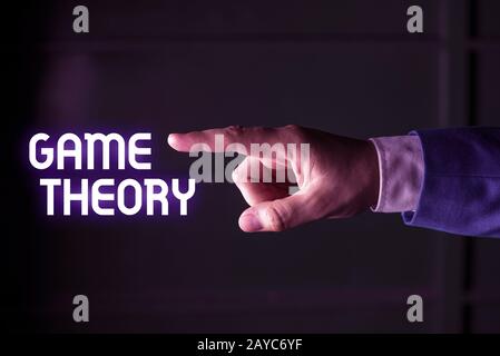 Handschriftertext-Schreibspiel-Theorie. Konzept Bedeutung Bereich der Mathematik mit der Analyse von Strategien isoliert Hand Stockfoto