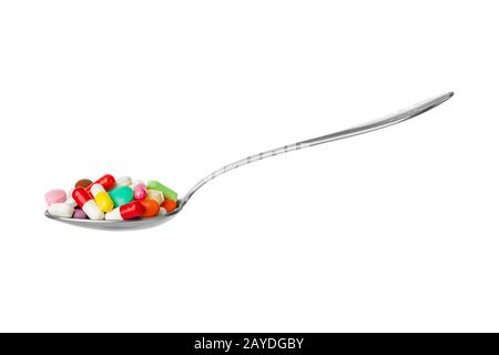 Löffel mit Pillen Stockfoto