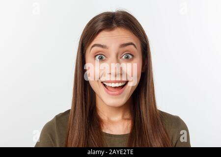 Close-up Portrait von überrascht schöne Mädchen ihren Kopf in Erstaunen und mit offenem Mund. Auf weissem Hintergrund Stockfoto