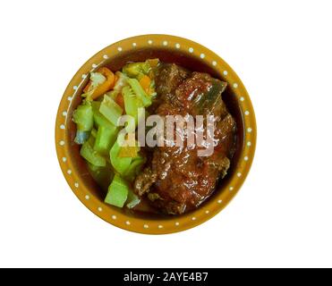 Ziege und Tomatenbredie Stockfoto