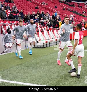 Amsterdam, Niederlande. Februar 2020. Amsterdam, 16-02-2020, JohanCruyff Arena, Saison 2019/2020, niederländischer Fußball-Wahlredivisie Ajax-Spieler Lisandro Martinez Ajax-Spieler Ryan Babel Ajax-Spieler Dusan Tadic während des Spiels Ajax - RKC Waalwijk. Credit: Pro Shots/Alamy Live News Stockfoto