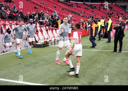 Amsterdam, Niederlande. Februar 2020. Amsterdam, 16-02-2020, JohanCruyff Arena, Saison 2019/2020, niederländischer Fußball-Wahlredivisie Ajax-Spieler Lisandro Martinez Ajax-Spieler Ryan Babel Ajax-Spieler Dusan Tadic während des Spiels Ajax - RKC Waalwijk. Credit: Pro Shots/Alamy Live News Stockfoto