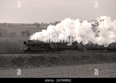 Weltberühmte Dampfeisenbahn Flying Scotsman, die auf der Watercress Line in Hampshire läuft. Anwesend bei der Wiedereröffnung der gesamten Alresford to Alton Line. Stockfoto