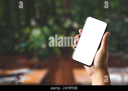 Schließen bis Mann die Hände mit Smart Phone Technology und Phone Technology Trends Stockfoto