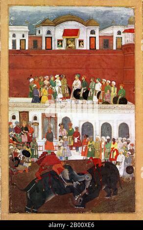 Indien: Ein Miniaturbild von Shah Jahan der prächtige und zwei seiner Söhne beobachten aus Fenstern wie Elefanten kämpfen im Hof des Roten Fort in Delhi, c. 1650. Shahab-ud-din Muhammad Khurram Shah Jahan I. (1592–1666) war von 1628 bis 1658 Kaiser des Moghul-Reiches in Indien. Der Name Shah Jahan stammt aus dem Persischen und bedeutet ‘König der Welt’. Er war der fünfte Moghul-Herrscher nach Babur, Humayun, Akbar und Jahangir. In seiner Jugend war er ein Liebling seines legendären Großvaters Akbar der große. Stockfoto