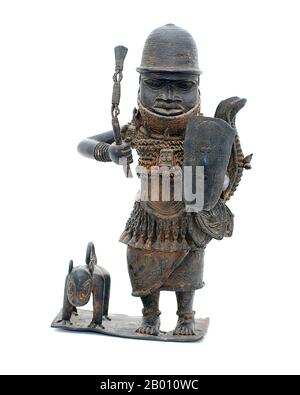 Nigeria: Bronzefigur eines Edo-Kriegers mit Jagdleopard, vom Hof des Benin-Königreiches, 16th. Jahrhundert. Das Benin-Reich (1440–1897) war ein vorkolonialer afrikanischer Staat im heutigen Nigeria. Es ist nicht zu verwechseln mit dem modernen Land Benin (und früher Dahomey genannt). Stockfoto