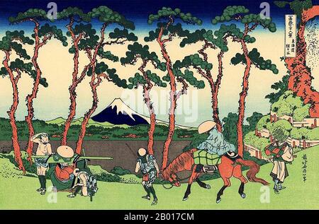 Japan: ‘Hodogaya auf der Tokaido-Straße’. Ukiyo-e Holzschnitt aus der Serie ‘Thirty-Six views of Mount Fuji’ von Katsushika Hokusai (31. Oktober 1760 - 10. Mai 1849), 1830. ‘Thirty-Six Views of Mount Fuji’ ist eine Serie von Holzschnitten der japanischen Künstlerin Katsushika Hokusai, die „Sukiyo-e“ ‘. Die Serie zeigt den Fuji in unterschiedlichen Jahreszeiten und Wetterbedingungen an verschiedenen Orten und Entfernungen. Es besteht tatsächlich aus 46 Drucken, die zwischen 1826 und 1833 entstanden sind. Die ersten 36 wurden in die Originalpublikation aufgenommen, und aufgrund ihrer Popularität wurden nach der Originalpublikation 10 weitere hinzugefügt Stockfoto