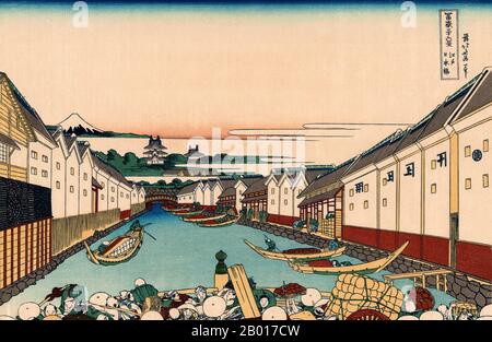 Japan: „Nihonbashi-Brücke in Edo“. Ukiyo-e Holzschnitt aus der Serie ‘Thirty-Six views of Mount Fuji’ von Katsushika Hokusai (31. Oktober 1760 - 10. Mai 1849), 1830. ‘Thirty-Six Views of Mount Fuji’ ist eine Serie von Holzschnitten der japanischen Künstlerin Katsushika Hokusai, die „Sukiyo-e“ ‘. Die Serie zeigt den Fuji in unterschiedlichen Jahreszeiten und Wetterbedingungen an verschiedenen Orten und Entfernungen. Es besteht tatsächlich aus 46 Drucken, die zwischen 1826 und 1833 entstanden sind. Die ersten 36 wurden in die Originalpublikation aufgenommen, und aufgrund ihrer Popularität wurden nach der Originalpublikation 10 weitere hinzugefügt. Stockfoto