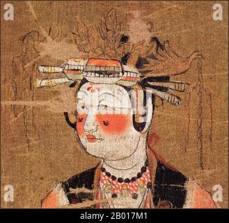 China: Eine wohlhabende Spenderin, die auf dem Höhepunkt der zeitgenössischen Mode gekleidet und aufgemacht wurde. Hängende Schriftrolle Malerei, Mogao Höhlen, Dunhuang, c. 950-1000. Die Mogao-Höhlen oder Mogao-Grotten (Chinesisch: mògāo kū, auch bekannt als die Höhlen der Tausend Buddhas und Dunhuang Höhlen) bilden ein System von 492 Tempeln 25 km (15,5 Meilen) südöstlich des Zentrums von Dunhuang, einer Oase, die strategisch an einer religiösen und kulturellen Kreuzung an der Seidenstraße in der Provinz Gansu, China, liegt. Die Höhlen enthalten einige der schönsten Beispiele buddhistischer Kunst, die sich über einen Zeitraum von 1.000 Jahren erstreckt. Stockfoto