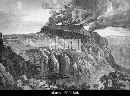 Äthiopien: 'Die Zerstörung von Magdala'. Gravur aus den 'Illustrated London News', c. 1868. Die britische Expedition 1868 nach Abessinien war eine Strafexpedition, die von Streitkräften des britischen Empire gegen das äthiopische Reich durchgeführt wurde. Kaiser Tewodros II. Von Äthiopien, auch bekannt als „Theodore“, inhaftierte mehrere Missionare und zwei Vertreter der britischen Regierung. Die von den Briten als Reaktion auf die Strafexpedition ins Leben gerufene Expedition erforderte den Transport einer beträchtlichen Militärmacht, die Hunderte von Meilen durch bergiges Gelände ohne jegliches Straßensystem führte. Stockfoto