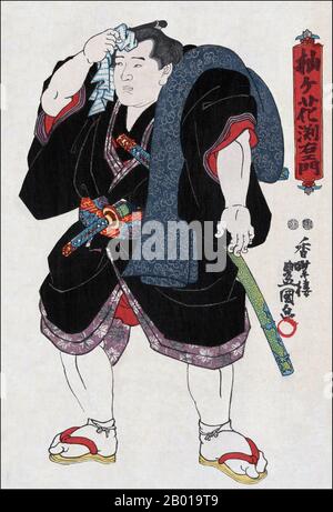 Japan: „Sumo Wrestler Somagahana Fuchiemon“. Ukiyo-e Holzschnitt von Utagawa Kunisada (1786. - 12. Januar 1865), 1850. Sumo ist ein wettbewerbsfähiger Vollkontakt-Sport, bei dem ein Ringer (Rikishi) versucht, einen anderen Ringer aus einem runden Ring (dohyō) zu zwingen oder den Boden mit etwas anderem als den Fußsohlen zu berühren. Der Sport entstand in Japan, dem einzigen Land, in dem er professionell ausgeübt wird. Es wird allgemein als Gendai budō (eine moderne japanische Kampfkunst) angesehen, obwohl diese Definition falsch ist, da der Sport eine Geschichte hat, die viele Jahrhunderte umfasst. Stockfoto