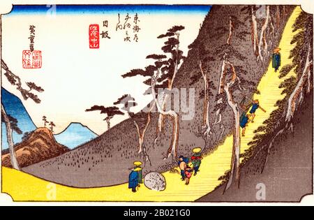 Japan: Station Fifteen: Abendschnee bei Kanbara. Ukiyo-e-Holzschnitt aus der Serie „Three Stations of the Tôkaidô Road“ von Utagawa Hiroshige (1797-1858), um 1834. Kambara: Ein Bergdorf bei Einbruch der Dunkelheit unter tiefem Schnee, durch das drei Menschen arbeiten, einer mit dem Kopf in einem halboffenen Regenschirm. Stockfoto