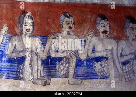 Thailand: Ein krues Wandbild von Betel-Käufern im Wat Ban Tha Kham, Mae Had Valley, in der Nähe von Chiang Mai im Norden Thailands. Das Mae Had Valley liegt im nördlichen Teil des Tals Chiang Mai. Der kleine Mae Had River verläuft durch das Tal. Die Menschen im Mae Had Valley sind überwiegend Khon Muang. Ihr gesamter Lebensstil ist eine Feier der Flachland- und Nassreis-Reisfelder-Kultur. Ihre Haltung ist konservativ, zurückhaltend, in der alten Welt. Stockfoto