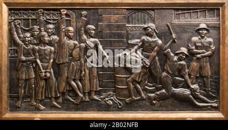 Vietnam: Basrelief, das Folter und Brutalität durch die französischen Kolonialisten im Gefängnis zeigt, Hoa Lo Gefängnismuseum (das alte französische Maison Centrale), Hanoi. Die französische Kolonialverwaltung baute 1896 das Hoa Lo Gefängnis. Ursprünglich sollten 450 Gefangene festgehalten werden, und in den 1930er Jahren war die Zahl der Inhaftierten auf fast 2.000 angestiegen, die politische Gefangene mit großer Mehrheit. Das Hoa Lo Gefängnis wurde während des Zweiten Indochina-Krieges als Ort der Inhaftierung für niedergeschlagene US-Piloten bekannt, die das Gefängnis ironischerweise „Hanoi Hilton“ nannten. Stockfoto