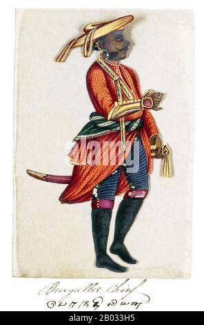 Eine Seite aus dem Manuskript siebzig Zwei Exemplare Von Kasten in Indien, die aus 72 handgemalten, vollfarbigen Bildern von Männern und Frauen der verschiedenen Kasten und religiösen und ethnischen Gruppen besteht, die in Madura, Indien zu dieser Zeit gefunden wurden. Jede Zeichnung wurde auf Glimmer hergestellt, einem transparenten, flockigen Mineral, das sich in dünne, transparente Bleche aufteilt. Wie auf der Präsentationsseite angegeben, wurde das Album vom indischen Schreibmeister an einer von amerikanischen Missionaren in Madura eingerichteten englischen Schule zusammengestellt und dem Reverend William Twining gegeben. Das Manuskript zeigt indisches Kleid und Schmuckschmuck im Stockfoto