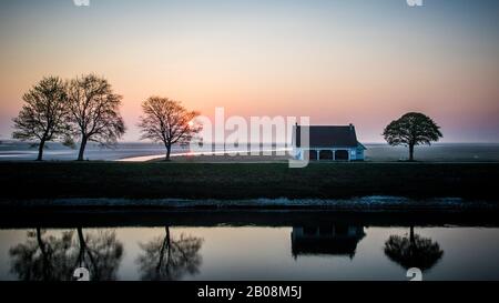 Lever de soleil sur la baie de Somme Stockfoto